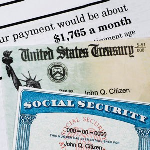 An image featuring a social security card and a tax form - CJ Henry Law Firm, PLLC.